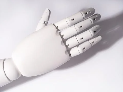 The robot's hand is on a white background 스톡 사진