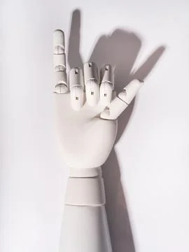 The robot's hand is on a white background Stock Photos