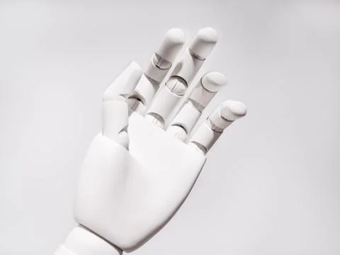 The robot's hand is on a white background Stock Photos