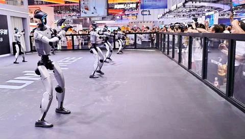 Robots Perform on Stage at 2026 World Robot Conference in Beijing Stock Photos