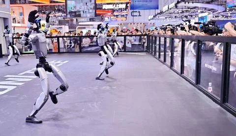 Robots Perform on Stage at 2026 World Robot Conference in Beijing Stock Photos