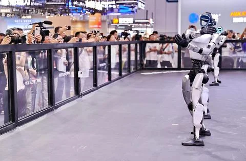 Robots Perform on Stage at 2026 World Robot Conference in Beijing Stock Photos