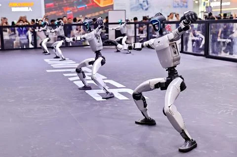 Robots Perform on Stage at 2026 World Robot Conference in Beijing Stock Photos