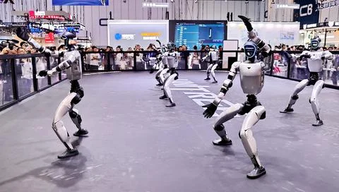 Robots Perform on Stage at 2026 World Robot Conference in Beijing Stock Photos