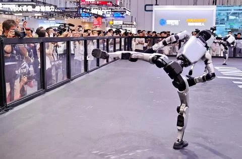 Robots Perform on Stage at 2026 World Robot Conference in Beijing Stock Photos