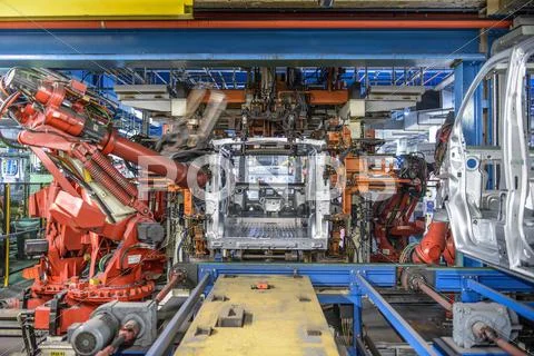 Robots Welding Van Body In Car Plant