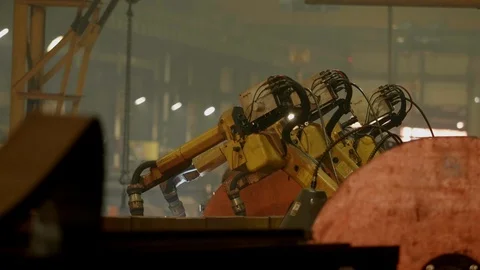 Robots works in a factory Stock Footage 128354454