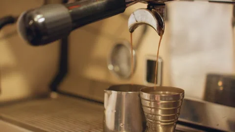 Robust coffee scene. Energetic cafe atmosphere with flowing dark brew. Vibrant Stock Footage 345168737