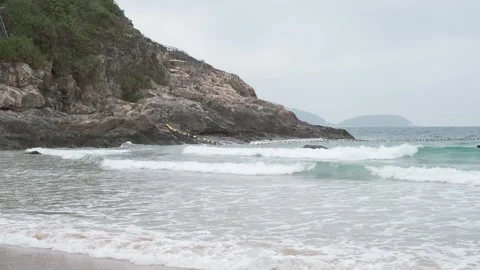 Rock and beach with ocean waves, natural background. Stock Footage 273009294