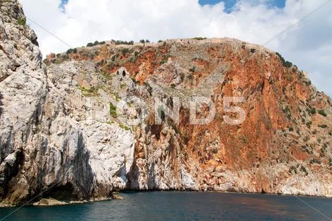 Rock and Mediterranean sea in Turkey Stock Photos