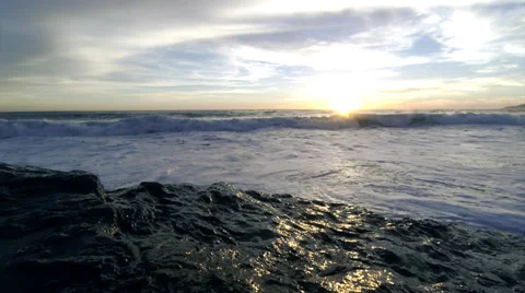 The rock and the ocean at sunset Vídeo Stock 36146330