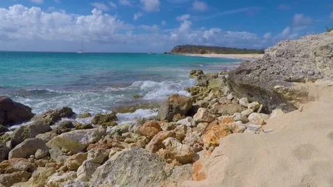 Rock and sand on the pristine beach of le Tintamarre Island in the Caribbean Stock Footage 92865068