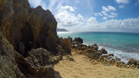 Rock and sand on the pristine beach of le Tintamarre Island in the Caribbean Video stock 92866643