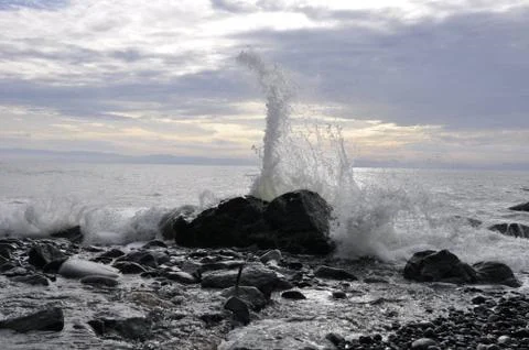 Rock and a wave 写真素材