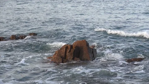 Rock and waves at slow motion Stock-Footage 134363507