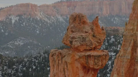 A rock atop a hoodoo in Bryce NP Stock Footage 268052002