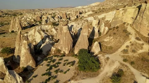 Rock balanced on chimneys eroded by time Stock Footage 237154878
