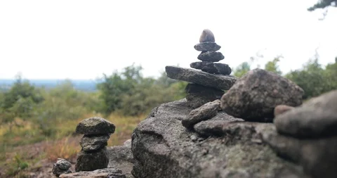 Rock Balancing at top of mountain trail Stock Footage 112471322