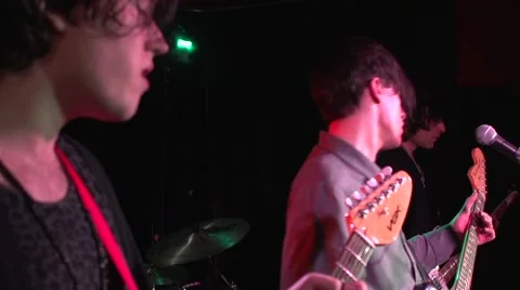 Rock band performing on stage   動画素材 50664352