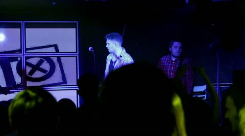 The rock band performs on stage Stock Footage 45392543
