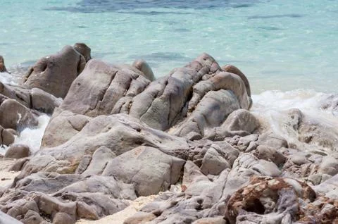 Rock on beach Stock Photos