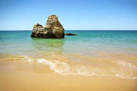 Rock on beach Stock Photos