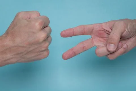 Rock Beats Scissors Stock Photos