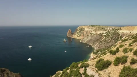 Rock in the black sea Stock Footage 159743023