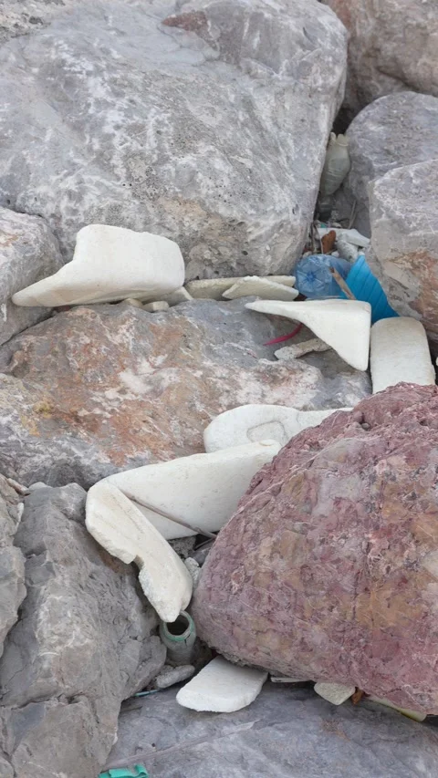 A rock with a blue object on it Stock Footage 276343908