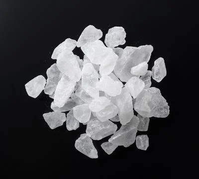 Rock candy on a black background. Stock Photos