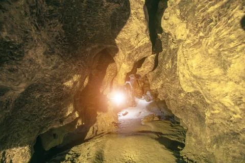 Rock cave with sunlight Foto stock
