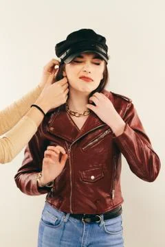 Rock chick in leather jacket, full length. Fashion portrait of elegant woma.. Stock Photos