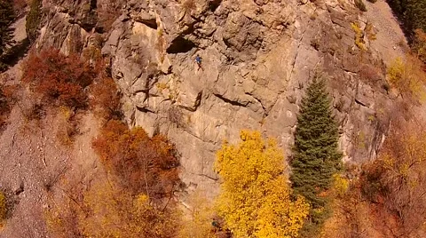 Rock climber aerial pull back Video stock 43555901