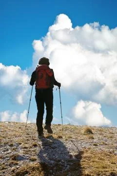 Rock climber ascending the mountain Stock Photos