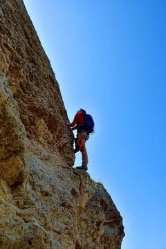 Rock climber with backpack Foto stock