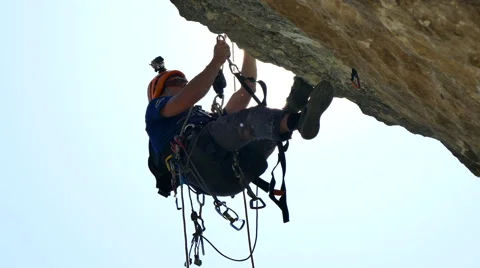 Rock Climber Climbing the Cliff Stock Footage 62315100