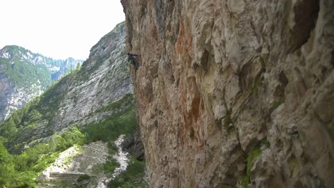 Rock Climber Climbing On The Cliff Stock Footage 114765368