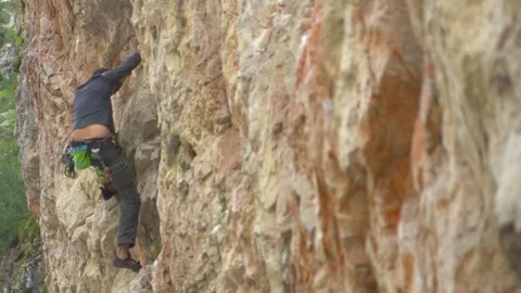 Rock Climber Climbing On The Cliff Stock Footage 114765722