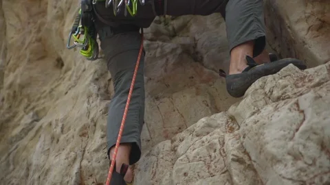 Rock Climber climbs in the Alps Stock Footage 114764485