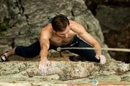 Rock Climber Climbs On A Cliff On A Rope, Top View Stock Photos