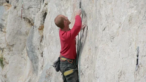 Rock climber clips protection Stock Footage 37772978