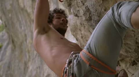 Rock climber close up Stock Footage