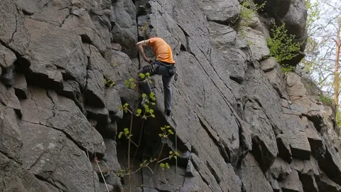 Rock Climber Is Coming Down Video stock 121343148