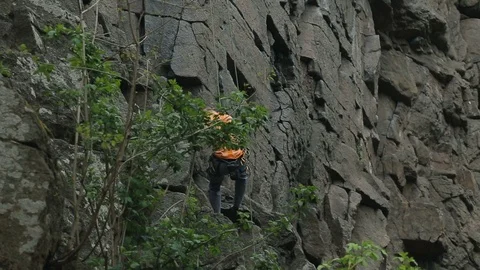 Rock Climber Is Coming Down Video stock 121343212