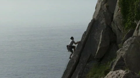 Rock climber reaching 스톡 동영상 280301