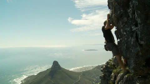 Rock climber scales rock on Table Mountain Stock Footage 22938507