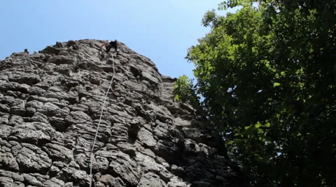 Rock Climber Slow Pan Video stock 54560367
