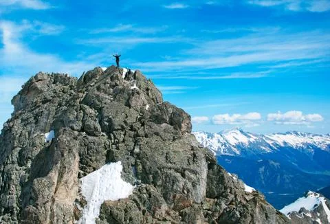 The rock-climber on the summit Stock-Fotos