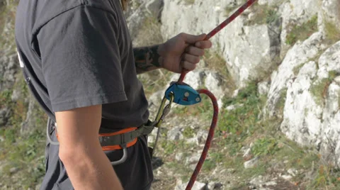 Rock climbing belay device HD Stock Footage 33531344