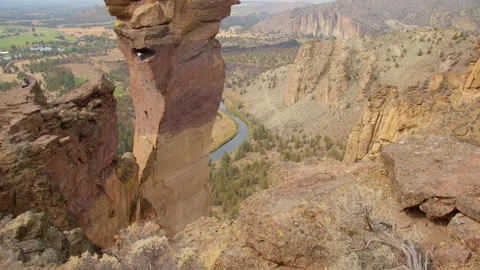Rock climbing couple ascending Monkey Face, Smith Rock State Park, Oregon Stock Footage 227932663